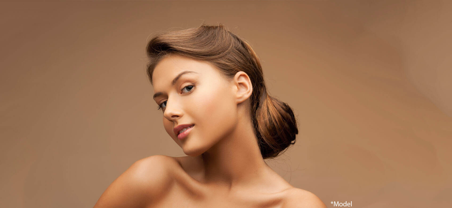 Close up of clean face of beautiful young woman